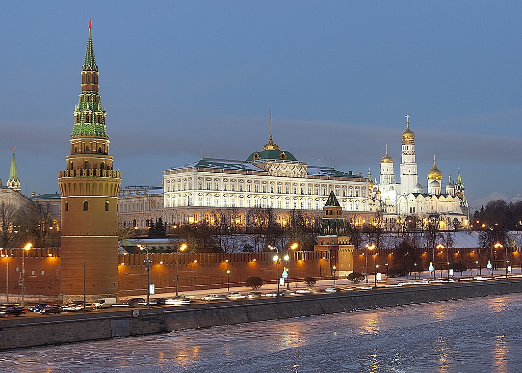 cold country with stunning red monuments and a red star on the top. The president of my country works in that white and gold